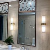 Vit rund rör upp- och nedåt belysning för badrum modern